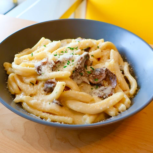 Chefs Pasta with Alfredo mushrooms and Truffle oil