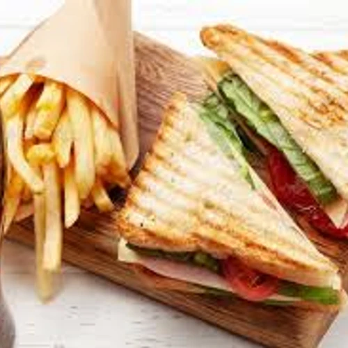 Club house sandwich with fries and soda