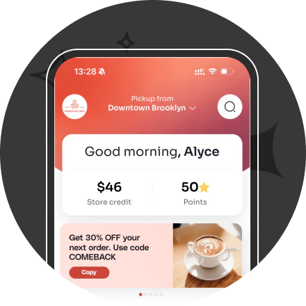 Mobile app screen showing Grounds avenue location with store credit $126, star balance 42, WiFi and bathroom access options, and a birthday greeting with a discount code.